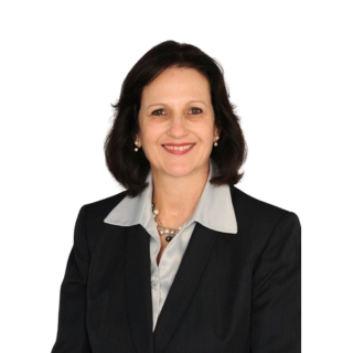 Image of a woman standing against a white background