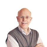 Image of a man standing against a white background